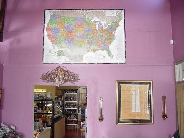A photo of the giant map of the USA and the Declaration of Independence on the wall at Scotto's